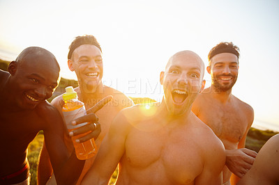 Buy stock photo Portrait of a group of sporty male friends enjoying time in the outdoors