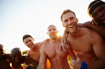 Buy stock photo Shot of a group of sporty male friends enjoying time in the outdoors