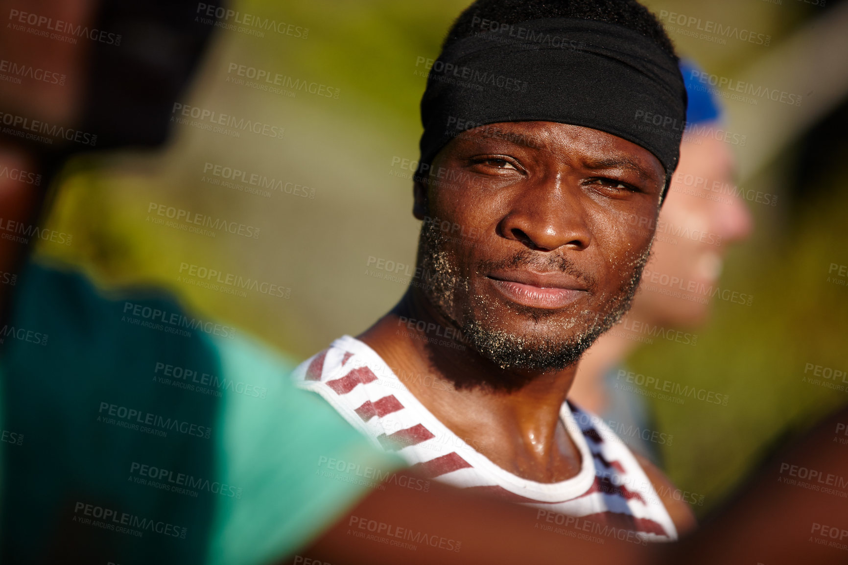 Buy stock photo Shot of a young man at bootcamp with his friends