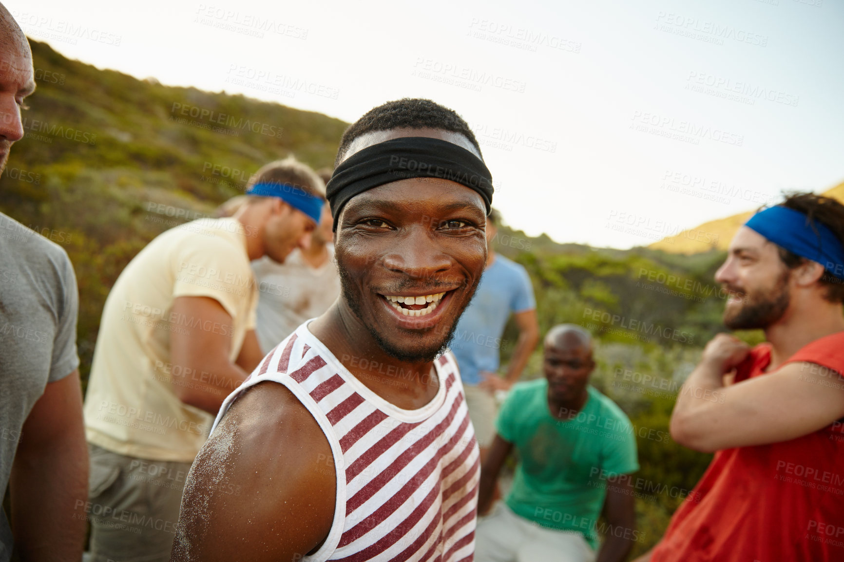 Buy stock photo Portrait of a young man at bootcamp with his friends