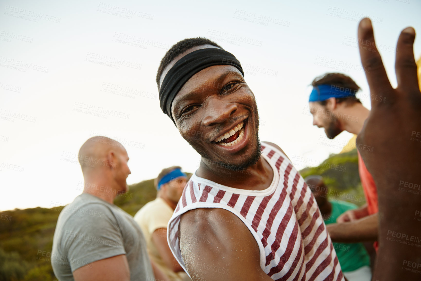 Buy stock photo Portrait of a young man at bootcamp with his friends