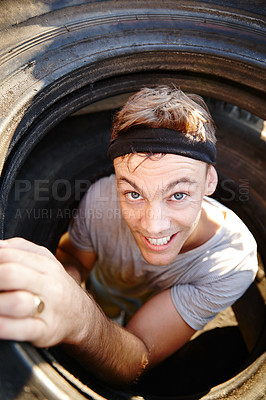 Buy stock photo Portrait of a young man who made it through an obstacle at a military bootcamp
