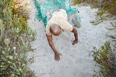 Buy stock photo Shot of a man going through an obstacle at bootcamp