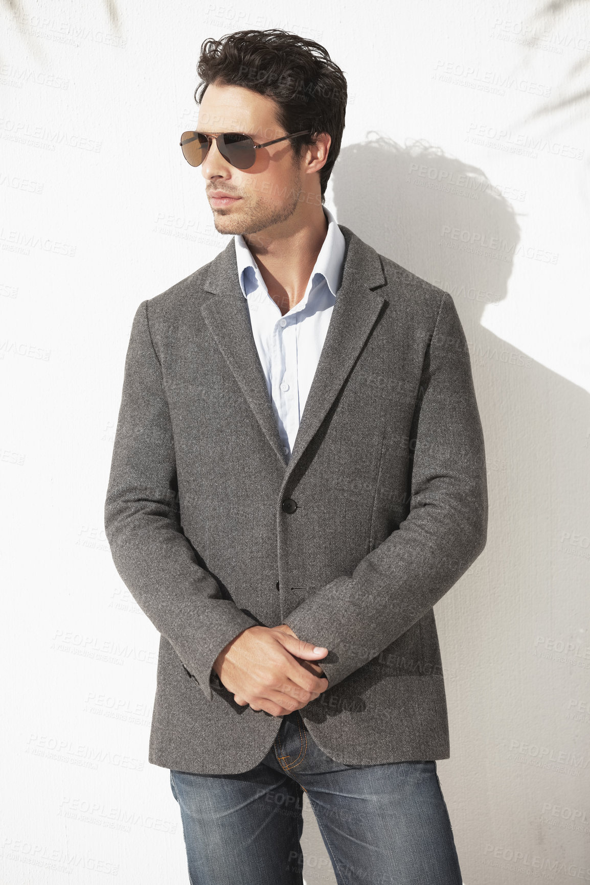 Buy stock photo Shot of a young man in a blazer