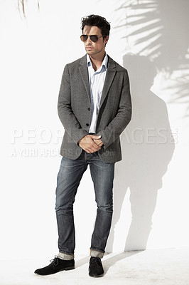 Buy stock photo Shot of a young man in a blazer