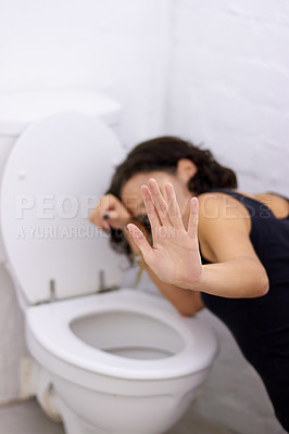 Buy stock photo Bathroom, hand and sick woman on floor suffering from anorexia, depression or anxiety. Stress, toilet and female with body dysmorphia, bulimia or an eating disorder, nausea and mental health problem