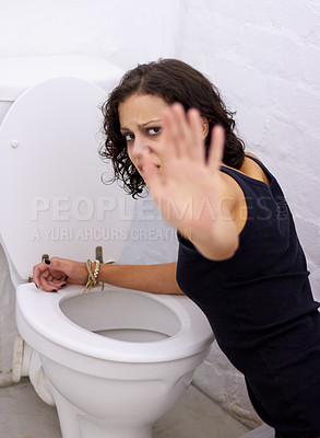 Buy stock photo Portrait, toilet and woman sick with bulimia or anorexia, problem or anxious to control weight or stop vomiting. Girl, bathroom and eating disorder habit or puke, nausea or hurt stomach after meal

