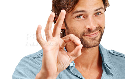 Buy stock photo Man, face and OK with hand in portrait, agreement or good review, feedback and emoji sign against studio background. Yes gesture, success and vote with approval and male voice positive opinion 