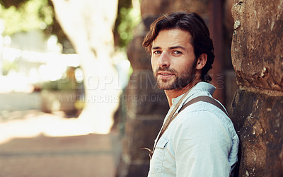 Buy stock photo Tourist, portrait or man in park on holiday, vacation or weekend trip for a adventure in Italy. Relax, travel or male person with fashion, confidence or freedom sightseeing in urban town on journey