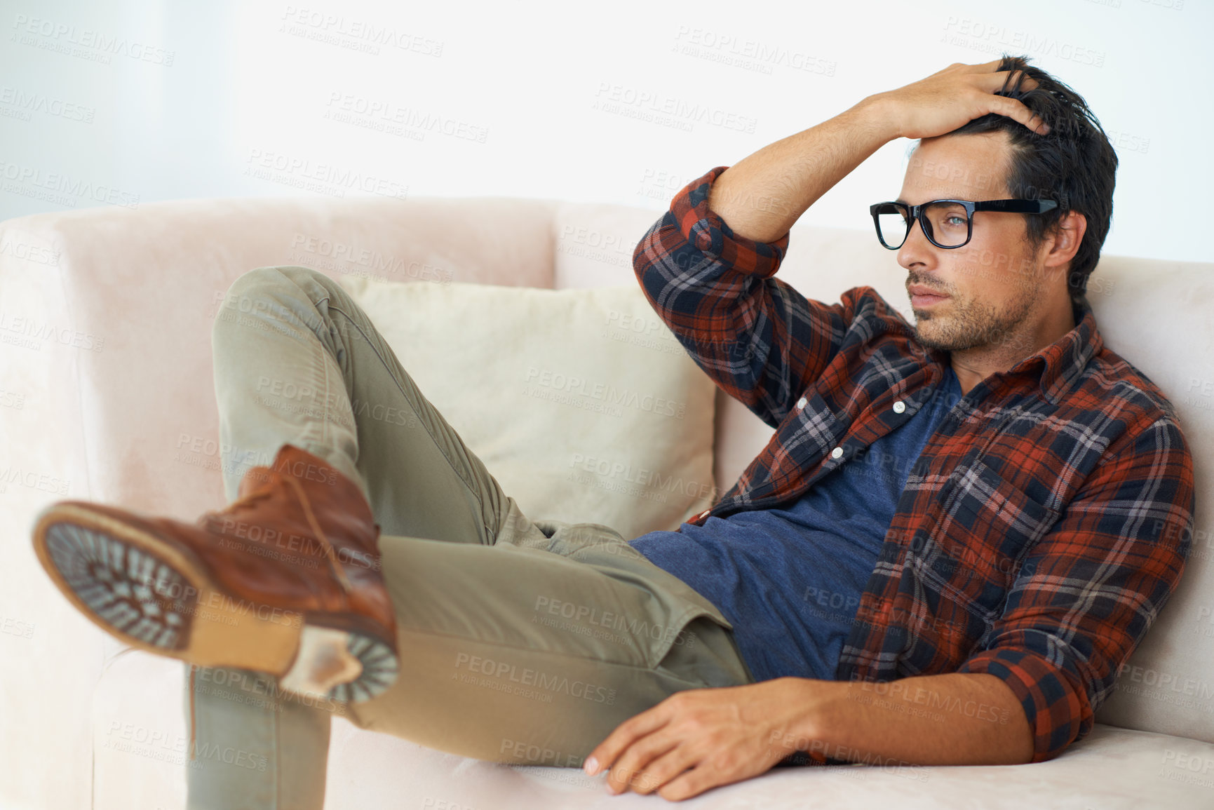 Buy stock photo Stress, thinking and man with anxiety on sofa in home with depression or crisis in mental health. Frustrated, person or worry for budget of finance, money or debt from unemployment or remember trauma