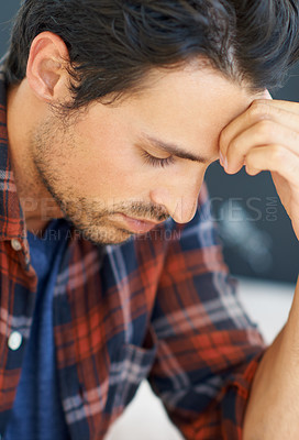 Buy stock photo Stress, thinking and man with headache from anxiety in home or closeup of crisis in mental health. Frustrated, person or worry for budget of finance, money or debt and depression in unemployment