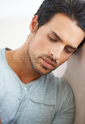 Buy stock photo Thinking, depression and sad man in a house with mistake, guilt or grieving, crisis or anxiety. Overthinking, face and male person at home with regret, mourning or broken heart, crisis or disaster