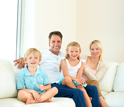 Buy stock photo Portrait of a loving family of four spending time together