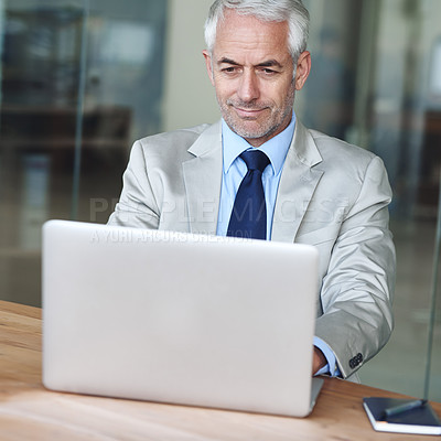 Buy stock photo Senior, businessman and smile, laptop and research at desk in the office for consultant advice. CEO, man and plan for budget, management and human resources in company for startup proposal and diary