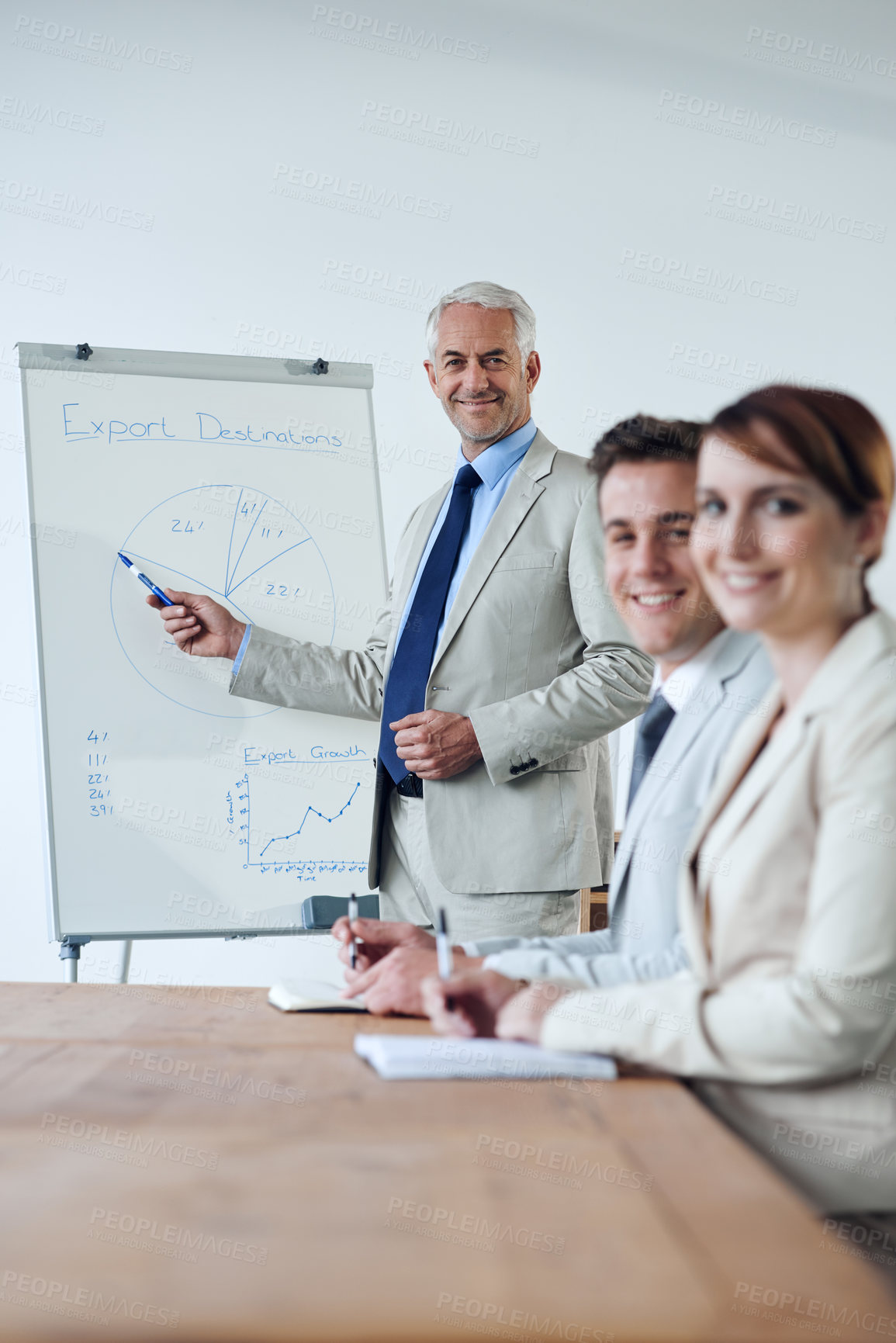 Buy stock photo Meeting, presentation and business people, boss and planning with collaboration or corporate training session. Seminar, information and CEO with whiteboard, smile in portrait for team and strategy