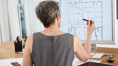 Buy stock photo Rearview shot of a female architect designing blueprints on her touchscreen computer