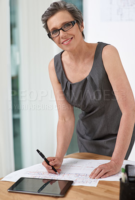 Buy stock photo Woman, architect and blueprint with drawing, portrait and smile with creativity for property design project in office. Mature person, floor plan and paper with pride, sketch and happy in Portugal