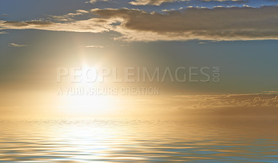 Buy stock photo Sunrise on the horizon, light rays shining on calm ocean water with copyspace. Peaceful harmony and fresh air, details of ripples and patterns on water surface. Beautiful sunset over soft blue waves