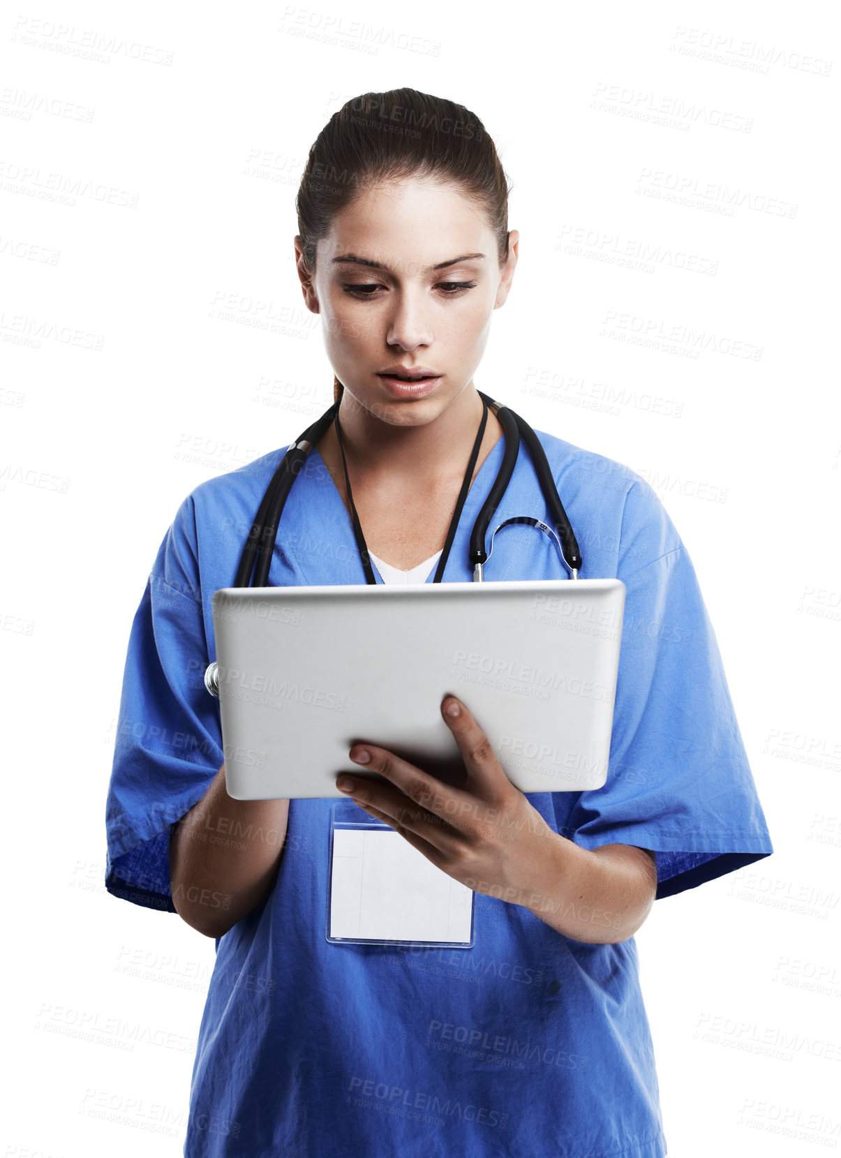 Buy stock photo Studio shot of a beautiful young doctor using a digital tablet against a white