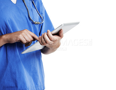 Buy stock photo Cropped studio shot of a doctor using a digital tablet against a white background