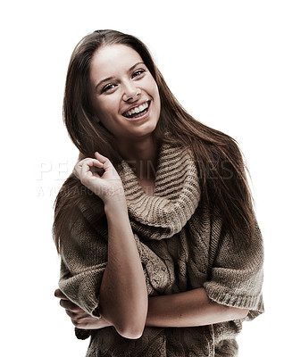 Buy stock photo Studio shot of a beautiful young woman dressed in warm winter clothing posing against a white background