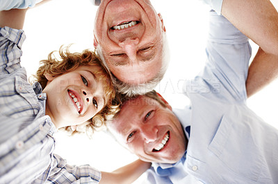 Buy stock photo Portrait of grandpa, dad and child in circle for bonding, relationship and generations. Family home, happy and huddle of grandfather, father and young boy for love, relax and fun together on weekend