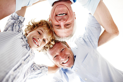 Buy stock photo Portrait of grandpa, father and child huddle in circle for bonding, relationship and generations. Family home, happy and low angle of grandfather, dad and young boy for love, relax and fun on weekend