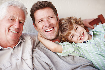 Buy stock photo Portrait, hug and kid with father, grandfather and laughter in a house with care, trust and support. Happy family, bonding and man generations in living room for weekend, vacation or reunion at home