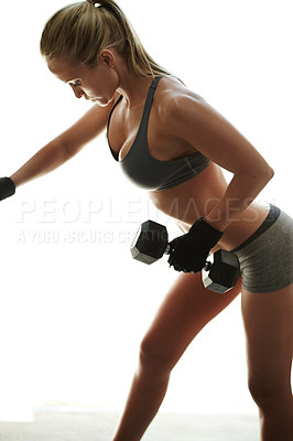 Buy stock photo Dumbbell row, bodybuilder or woman in gym for workout, fitness and exercise for health, challenge or sports. Energy, strong and girl athlete lifting weights for balance, training or muscle growth