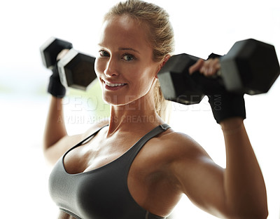 Buy stock photo Shoulder press, portrait or woman in studio with dumbbells for fitness, workout or gym for arms or health. Face, smile or bodybuilder lifting weights for exercise, body training or muscle in Germany