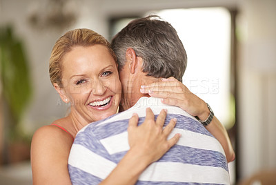 Buy stock photo Portrait of a beautiful woman embracing her husband