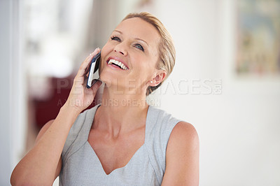 Buy stock photo Cropped shot of an attractive businesswoman talking on the phone