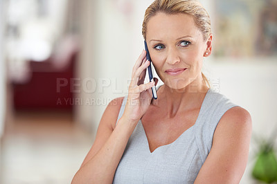 Buy stock photo Cropped shot of an attractive businesswoman talking on the phone