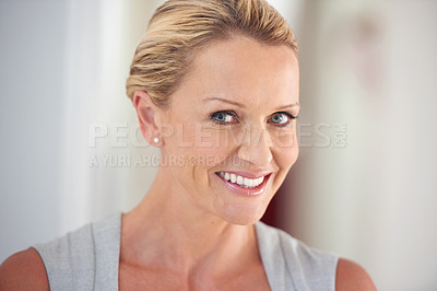 Buy stock photo Cropped portrait of an attractive businesswoman standing in the office