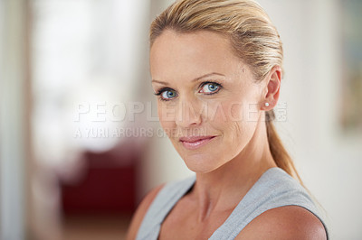 Buy stock photo Cropped portrait of an attractive businesswoman standing in the office