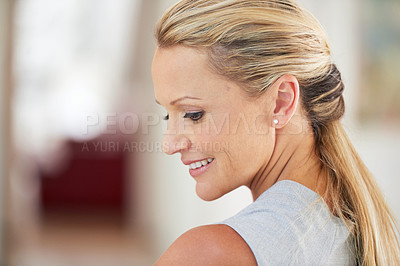 Buy stock photo Cropped shot of an attractive businesswoman standing in the office
