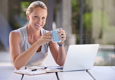 Buy stock photo Cropped portrait of an attractive businesswoman working on her laptop