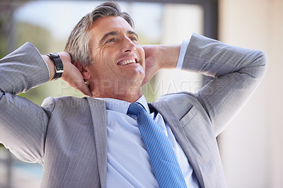 Buy stock photo Cropped shot of a handsome businessman in the office