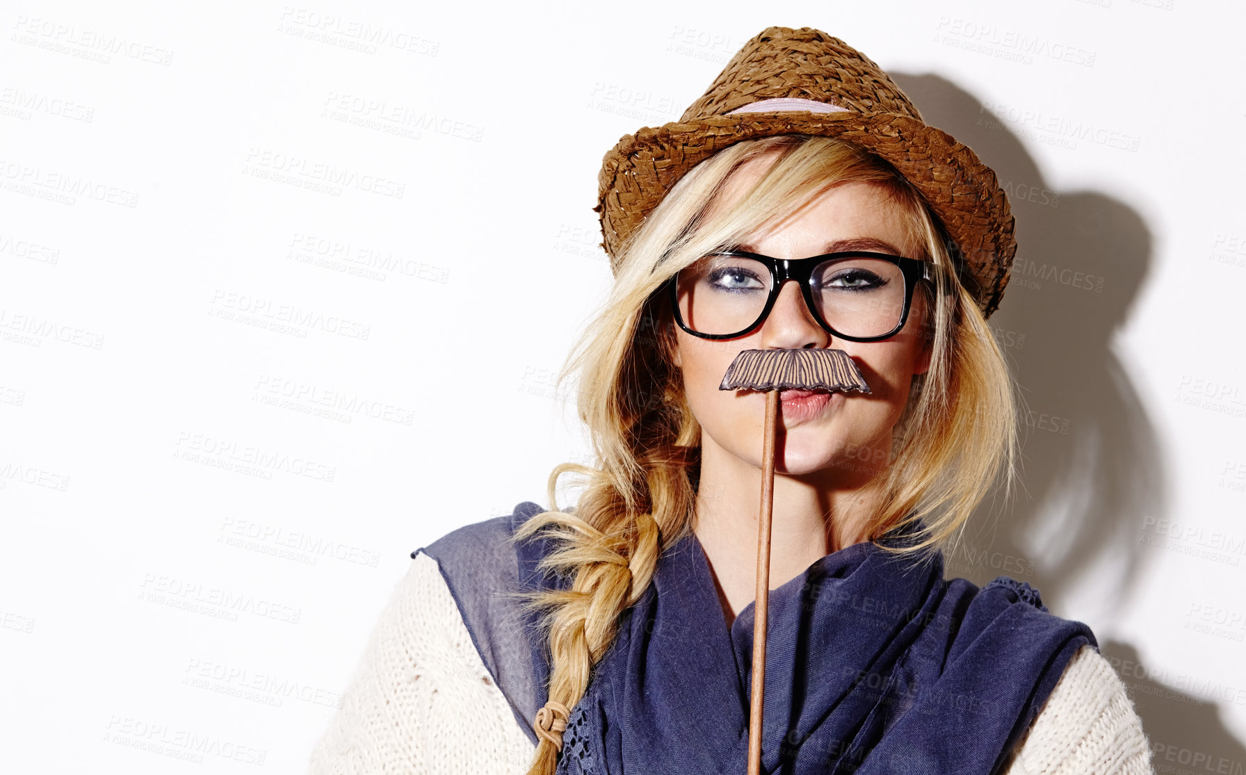 Buy stock photo Portrait, party and mustache costume with a woman in studio isolated on a white background for celebration. Face, fashion and glasses with a young person looking playful in a photo booth at an event