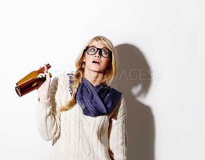 Buy stock photo Beer, drink or woman with mockup space for fun celebration, party or hipster event in studio. Thinking, girl or female person drinking alcohol or beverage in bottle looking up on white background 