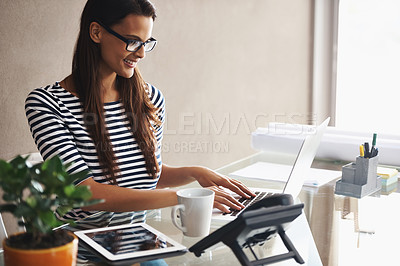 Buy stock photo Woman, desk and typing on laptop with research for article, checking email or editing in office. Writer, smile and thinking with technology for idea, planning or online communication at workplace