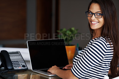 Buy stock photo Portrait, laptop screen and home office with designer woman in workplace for small business or startup. Desk, computer and smile with happy young employee in apartment for creative job or work