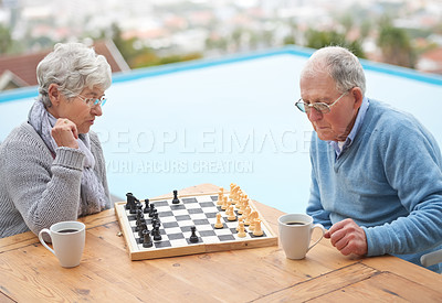 Buy stock photo Chess, game and senior couple outdoor together in retirement to relax with competition of strategy. Thinking, challenge and elderly man and woman with activity on board for holiday or vacation