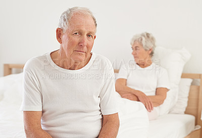 Buy stock photo Elderly, couple and sad in bedroom with conflict, ignore and crisis in marriage for mental health or retirement. Senior, woman or man with fight, argument or divorce on bed in home with disagreement 