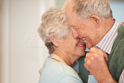 Buy stock photo Senior, couple and happy with dancing in home for bonding, support and holding hands with romance. Elderly, man and woman with hug, embrace and smile for relationship, dancer and affection or love 