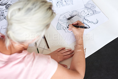 Buy stock photo Rearview shot of a female graphic artist working on illustrations at home