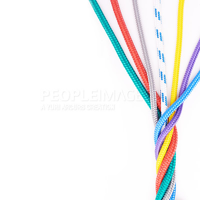 Buy stock photo Rope, ties or connection of colorful knot or braid on white background in studio for security. Tools, cords and abstract unity of rainbow society with texture together for hiking, climbing or safety