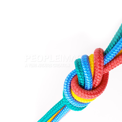 Buy stock photo Colourful, rope and knot  together in studio for tying with pride, unity and trust. Secure, rainbow and string for unique, security and stop movement of survival objects on isolated white background