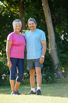 Buy stock photo Portrait of a mature husband and wife exercising together