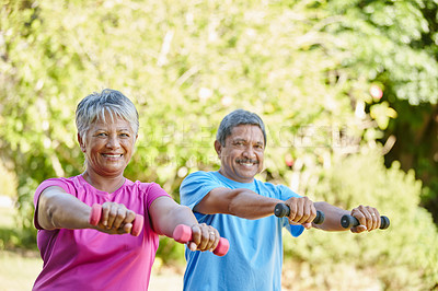 Buy stock photo Portrait of a mature couple exercising together in their backyard